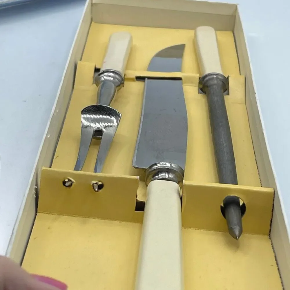Carvers made in Sheffield England set. Fork, knife & Steele.